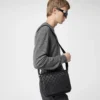 SAC DISTRICT PM EN CUIR DAMIER INFINI